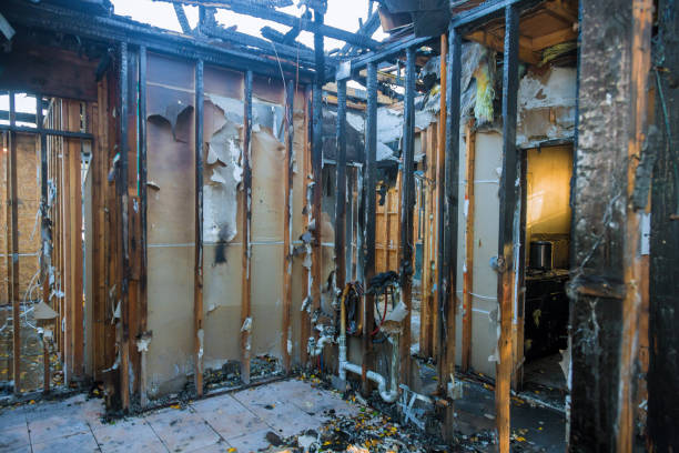 Professional Fire Damage Restoration technician working in Fayette, MO